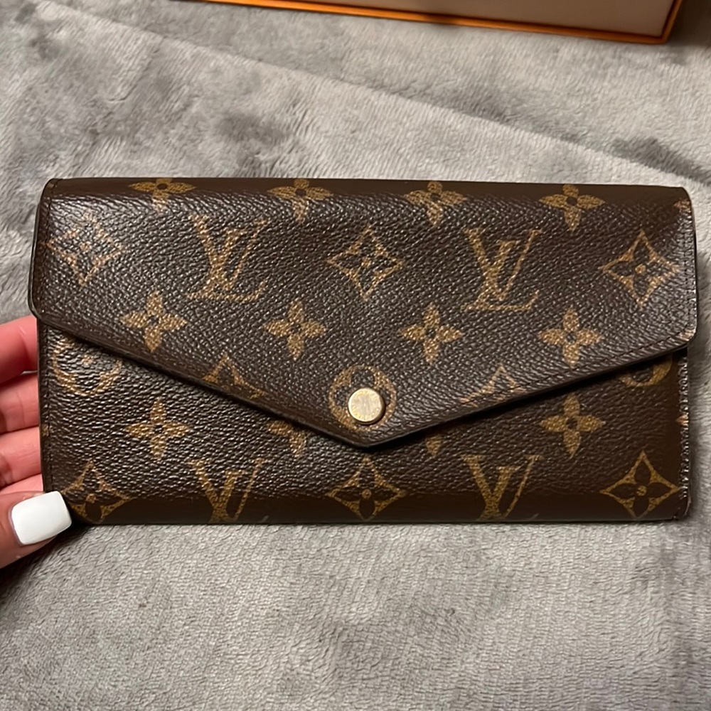 Authentic Louis Vuitton  monogram Sarah wallet red interior